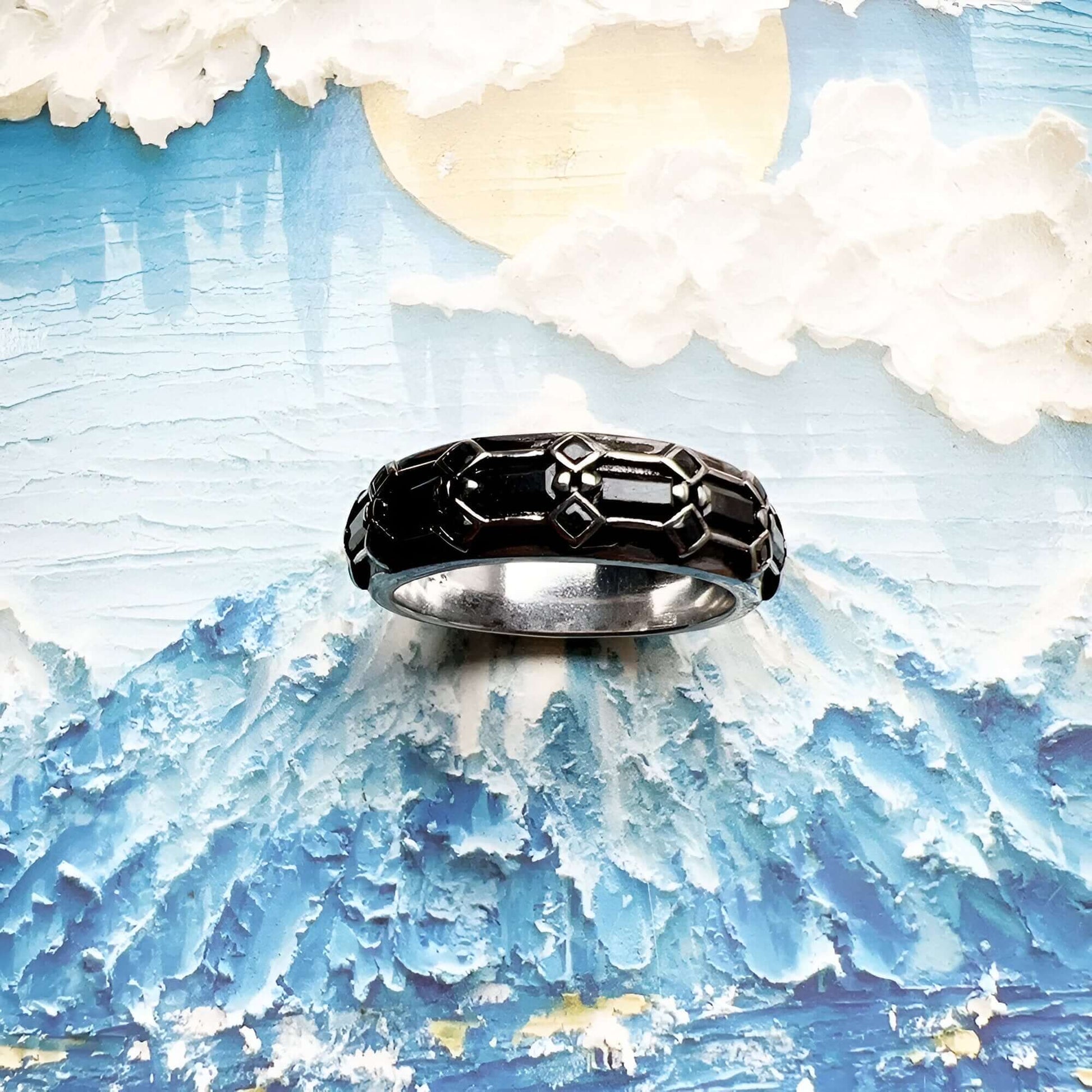 Bague à bande unisexe en argent 925 et platine sertie de diamants naturels noirs vue du dessus.