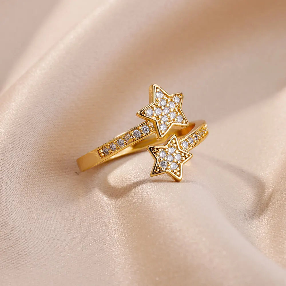 Bague ouverte en or étoiles filantes, effet scintillant avec pierres zircon, acier inoxydable plaqué or 18K, bijou intemporel et élégant.