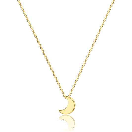 Collier fantaisie lune en or jaune sur fond blanc.