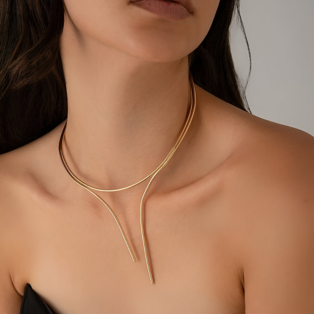 COLLIER TORQUE COURBES ENLACÉES EN OR