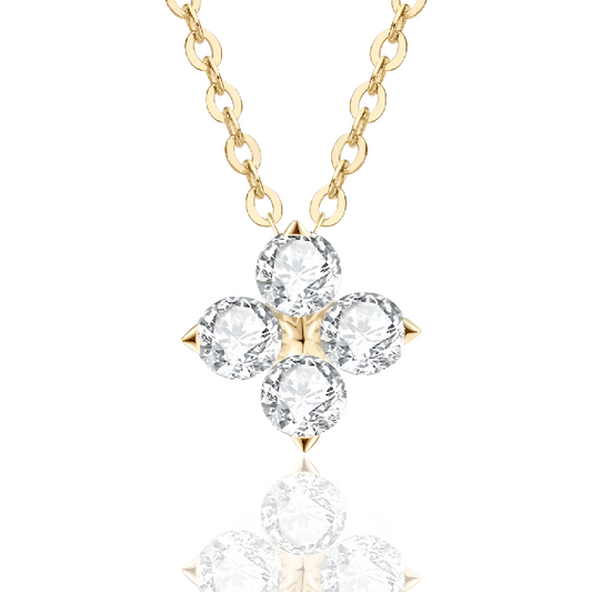 Pendentif solitaire en or jaune et diamants synthétiques sur fond blanc.