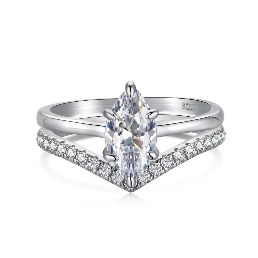 Bague de fiançailles double anneau variante or blanc à plat vue de face sur fond blanc.
