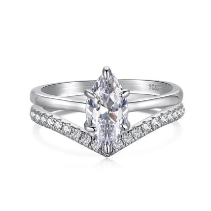 Bague de fiançailles double anneau variante or blanc à plat vue de face sur fond blanc.