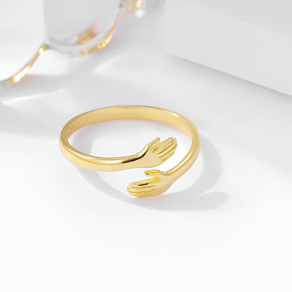 Bague fantaisie ouverte enlacement en argent 925 et or jaune à plat.