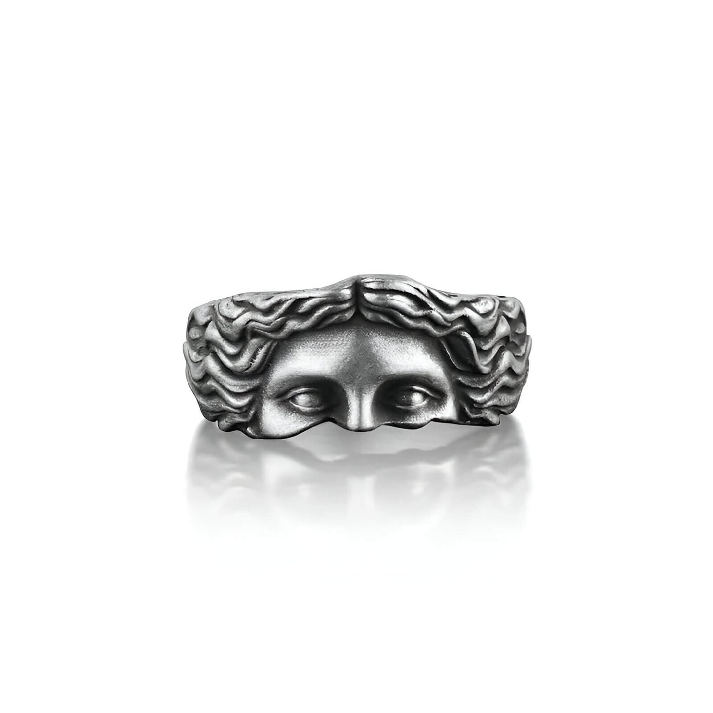 Bague rétro demi-visage de Vénus sculpté en acier inoxydable 316L sur fond blanc.