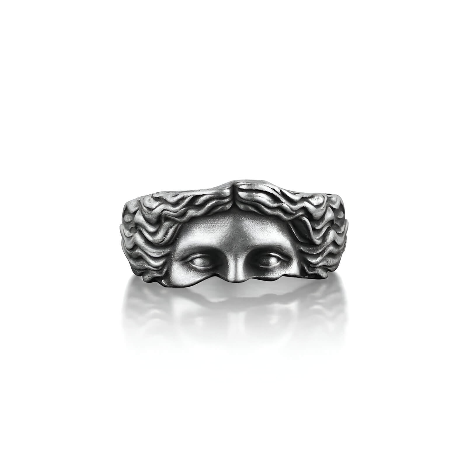Bague rétro demi-visage de Vénus sculpté en acier inoxydable 316L sur fond blanc.