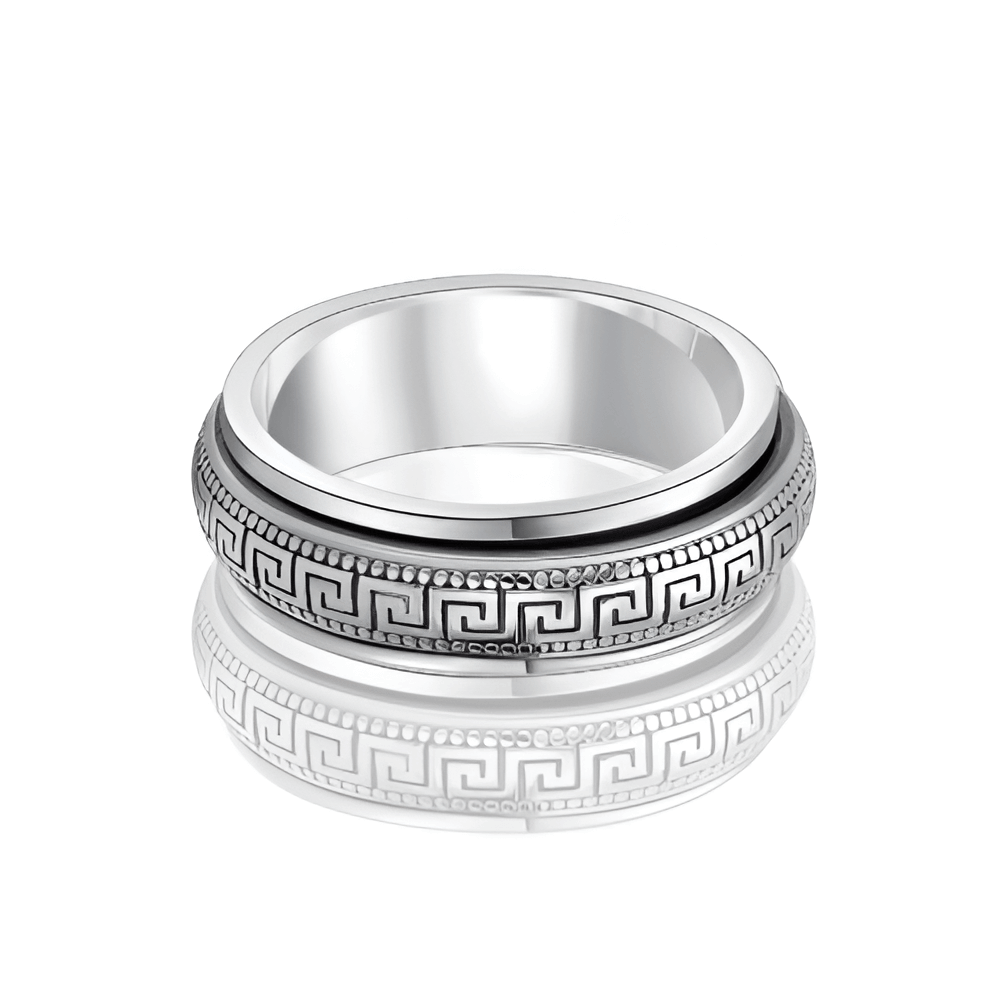 Bague rotative anti-stress en argent 925 et platine sur fond blanc.