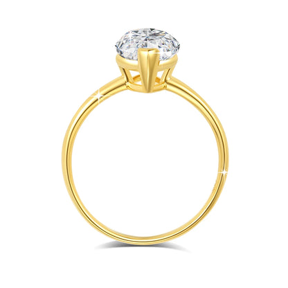 Bague solitaire diamant marquis serti barre en or jaune 14K rayonnant vue latérale.