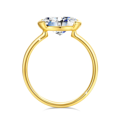 Bague solitaire diamant ovale 3ct serti semi-clos Orélia en or jaune 14K étincelant vue latérale.