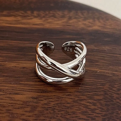 Bague triple croisement ajustable en argent 925 plaqué or blanc discret à plat.