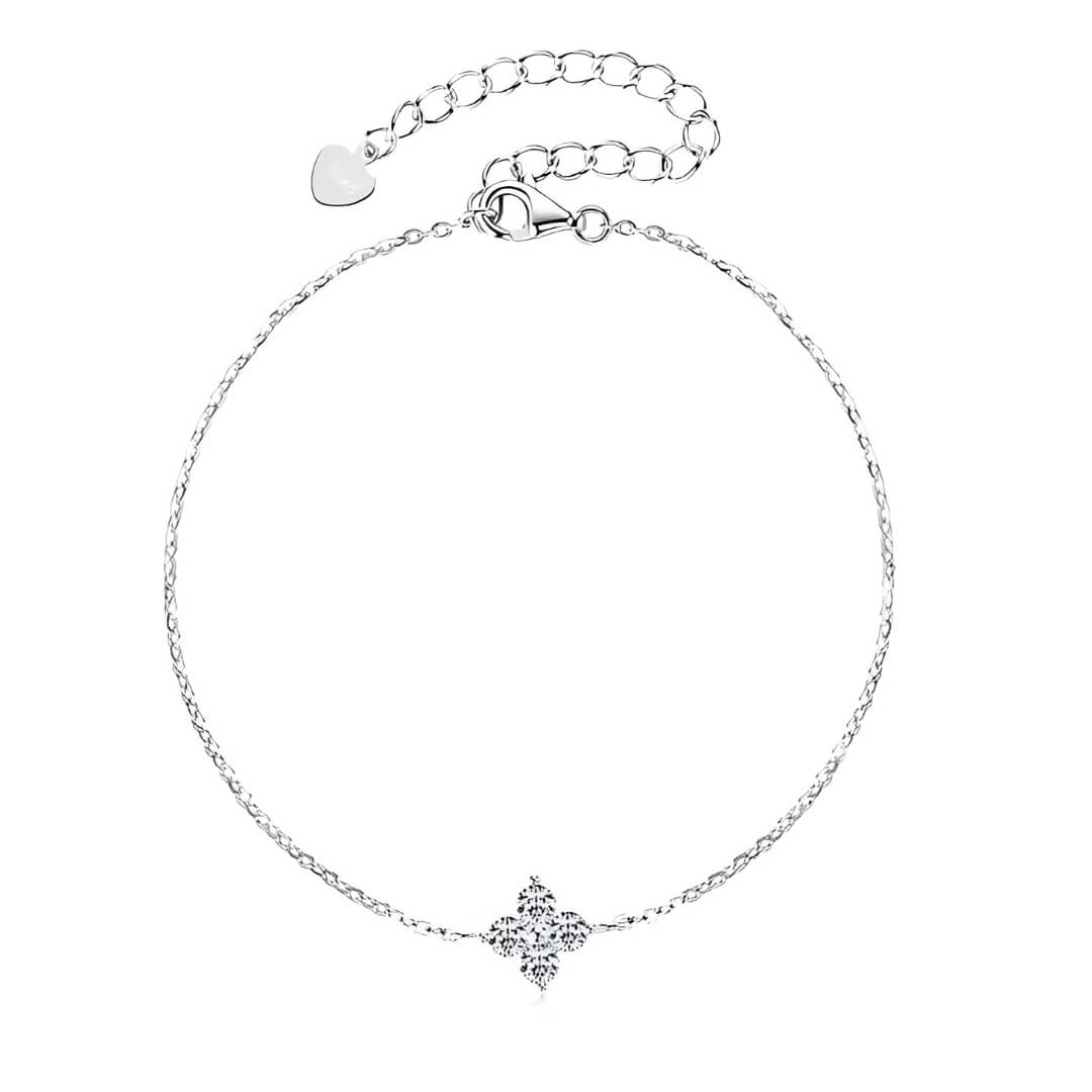 Bracelet chaîne fine fleur pavée en argent 925 plaqué or blanc et moissanites étincelantes vue du dessus.