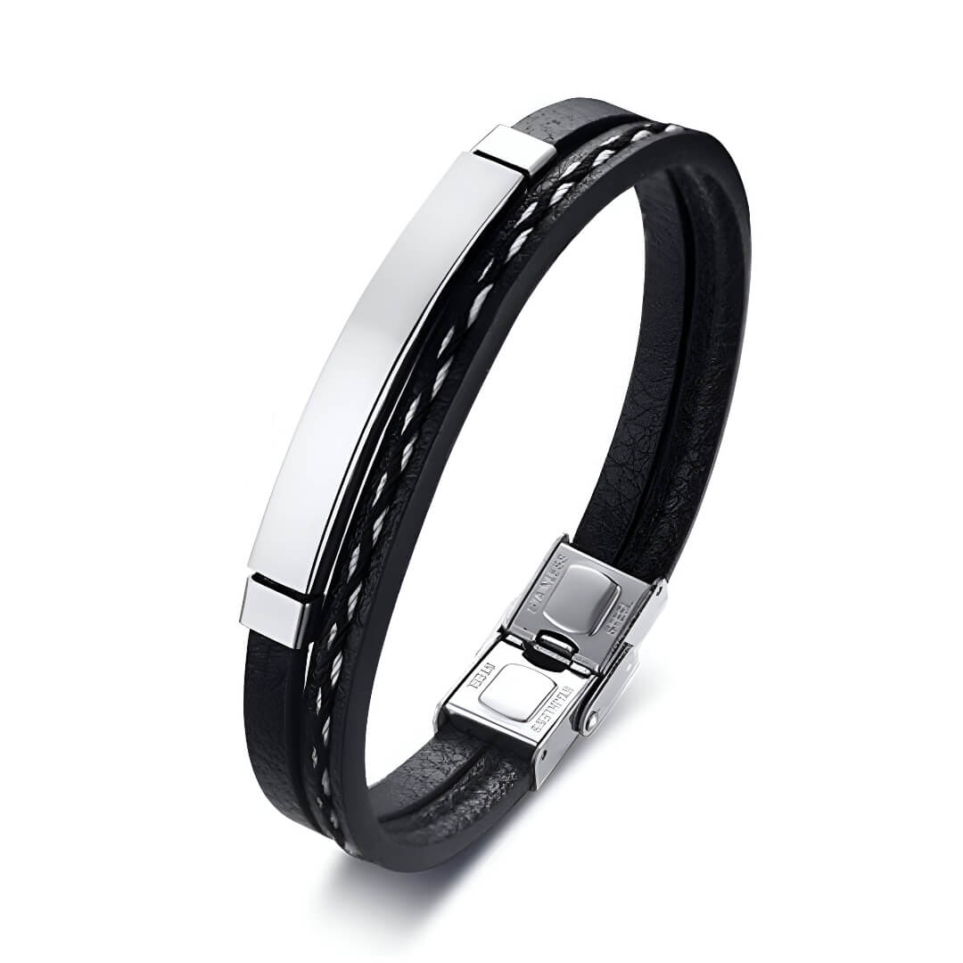 Bracelet cordon en cuir et acier inoxydable variante argent sur fond blanc.