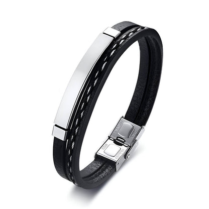 Bracelet cordon en cuir et acier inoxydable variante argent sur fond blanc.