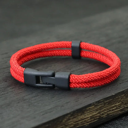 Bracelet double cordon loquet pivotant en zinc noir variante rouge à plat.