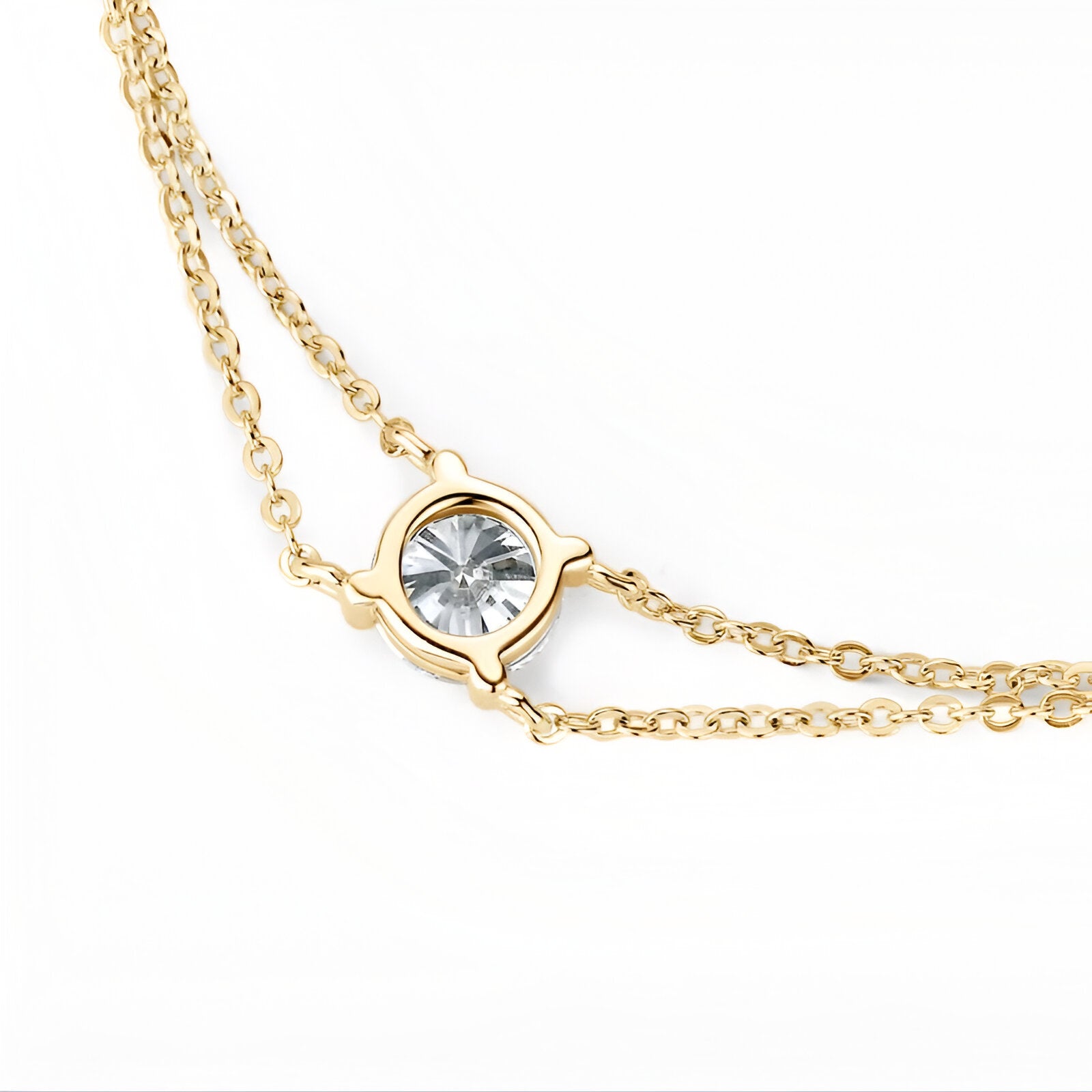 Bracelet double maile dorée en argent 925 plaqué or jaune et diamant solitaire éclatant vue de dos.