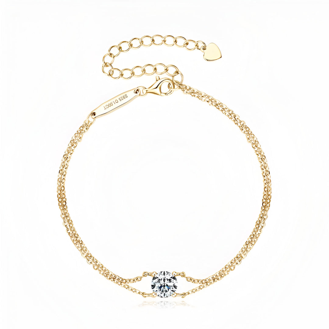 Bracelet double maile dorée en argent sterling 925 plaqué or jaune et diamant solitaire vue de face.