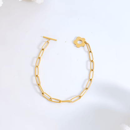 Bracelet fleur en acier plaqué or jaune vue du dessus.