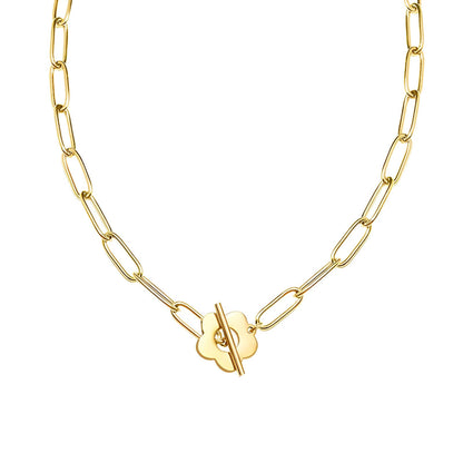 Bracelet fleur en acier plaqué or jaune sur fond blanc.