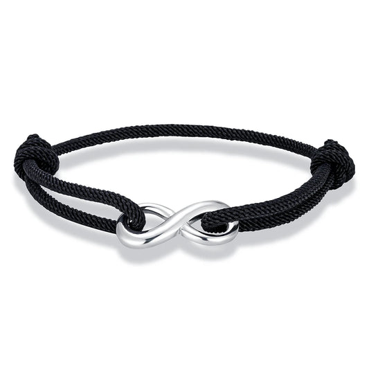 Bracelet infini ajustable en acier inoxydable blanc et cordon noir sur fond blanc.