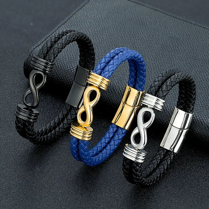 Bracelets infini en cuir noir et bleu, et acier inoxydable plaqué or jaune, argent 925 blanc et noir debout.