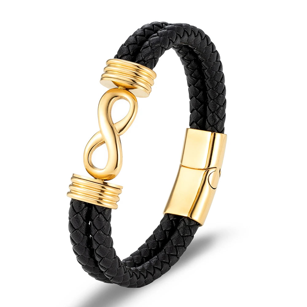 Bracelet infini en cuir noir et acier inoxydable plaqué or jaune sur fond blanc.