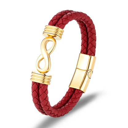 Bracelet infini en cuir rouge et acier inoxydable plaqué or jaune sur fond blanc.