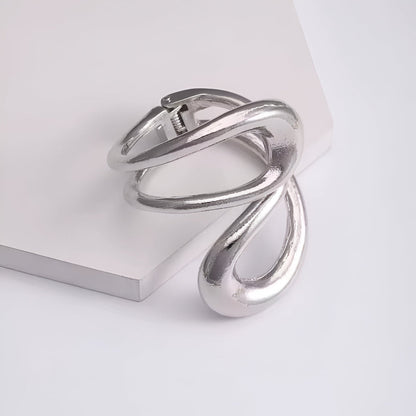 Bracelet manchette ajustable en or blanc vue de front.