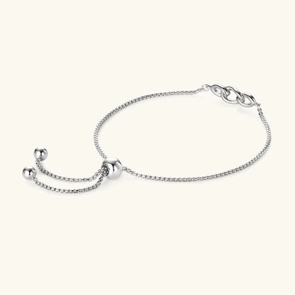 Chaîne amovible nœud en argent plaqué or blanc et diamants synthétiques vue de côté.