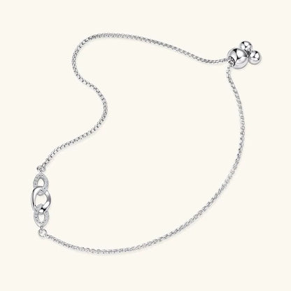 Chaîne amovible nœud en argent plaqué or blanc et diamants synthétiques à plat.