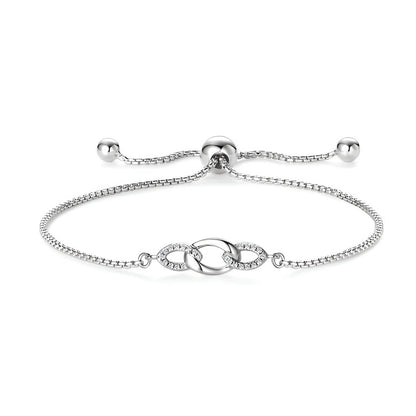 Chaîne amovible nœud en argent plaqué or blanc et diamants synthétiques sur fond blanc.