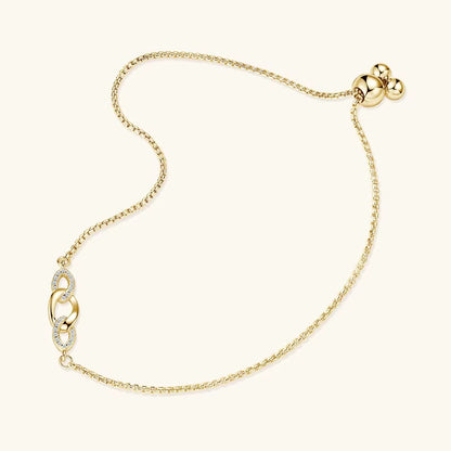 Chaîne amovible nœud en argent plaqué or jaune et diamants synthétiques à plat.