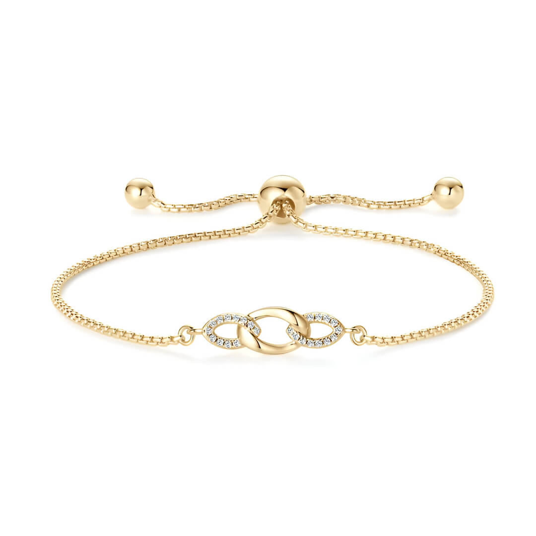 Chaîne amovible nœud en argent plaqué or jaune et diamants synthétiques sur fond blanc.