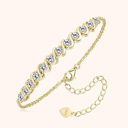 Chaîne fluide en argent 925 plaqué or jaune et diamants synthétiques en biais.