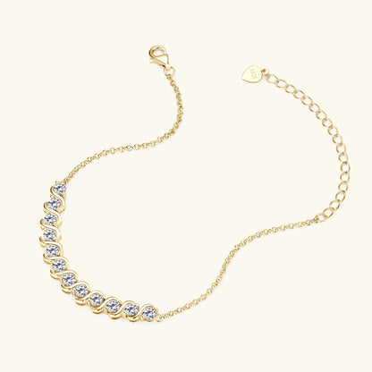 Chaîne fluide en argent 925 plaqué or jaune et diamants synthétiques à plat.