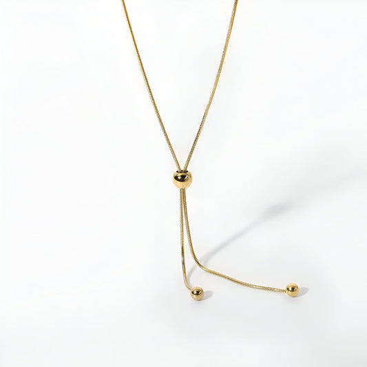 COLLIER GLISSE DORÉE À PERLES MOBILES LA PETITE REBELLE