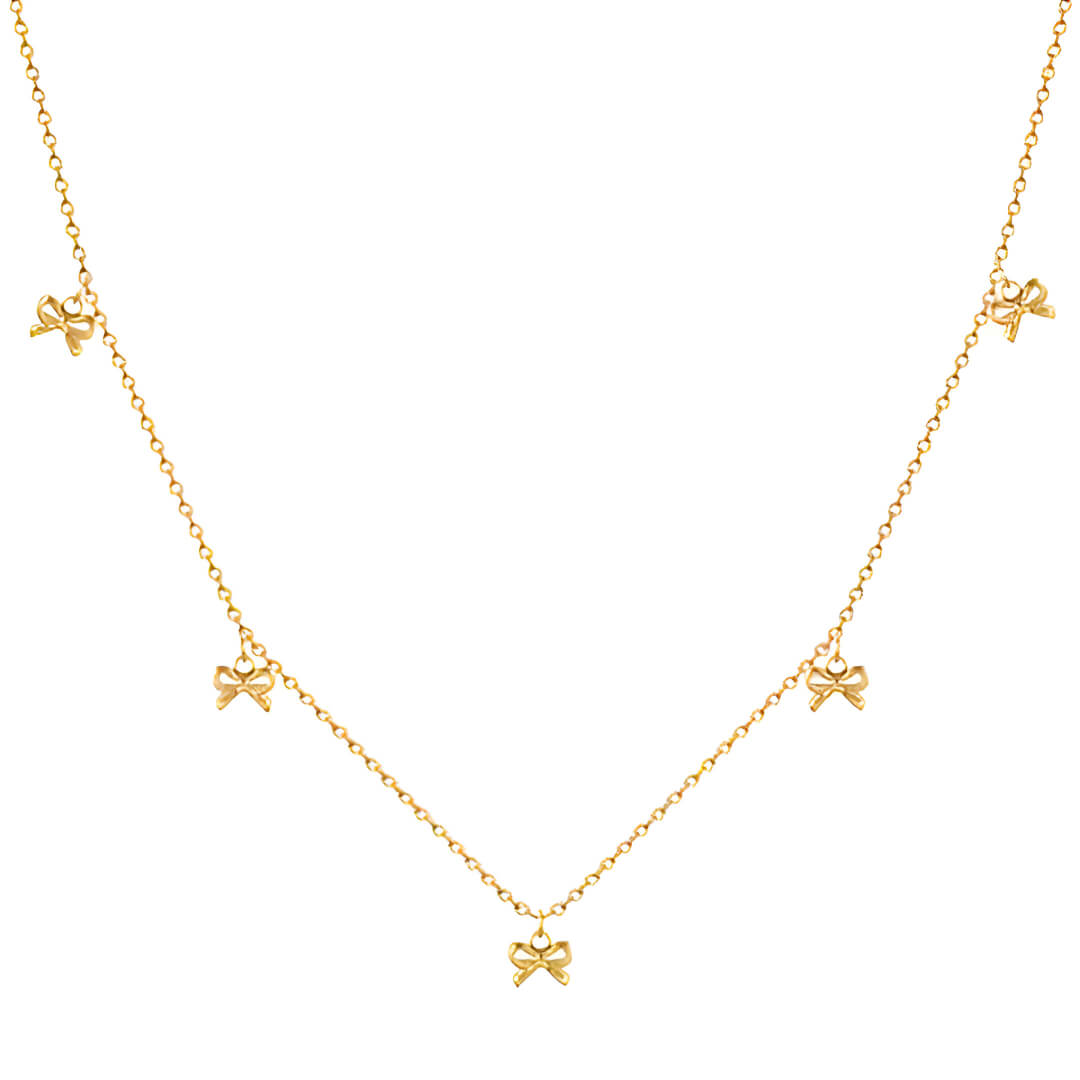 Collier nœud papillon en acier inoxydable plaqué or jaune variante breloques sur fond blanc