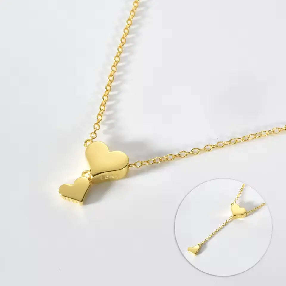 Collier sautoir cœur amovible en argent plaqué or jaune vue de proche.