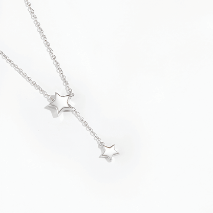 Collier sautoir étoile amovible en argent plaqué or blanc vue de proche.