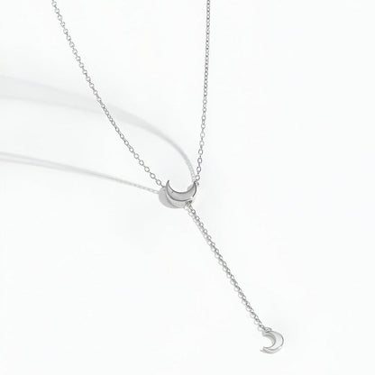 Collier sautoir lune amovible en argent 925 plaqué or blanc à plat.