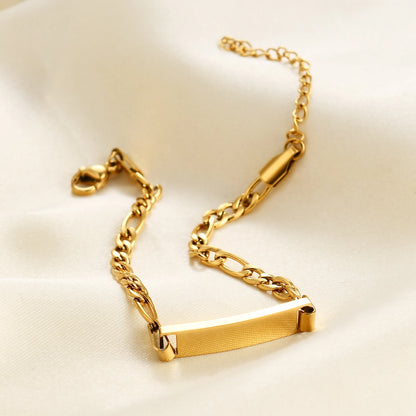 Gourmette chaîne cubaine ajustable en acier doré posé.