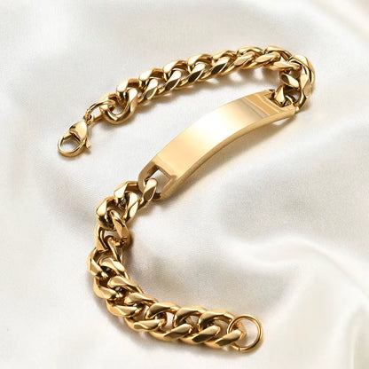 Gourmette maille cubaine en acier plaqué or jaune étalé.