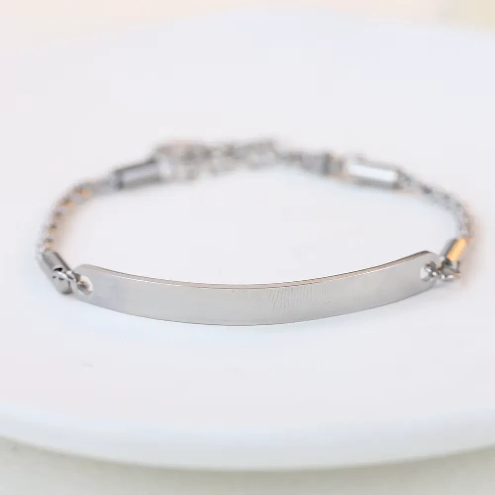 Gourmette maille torsadée en acier inoxydable plaqué titane blanc vue de face.