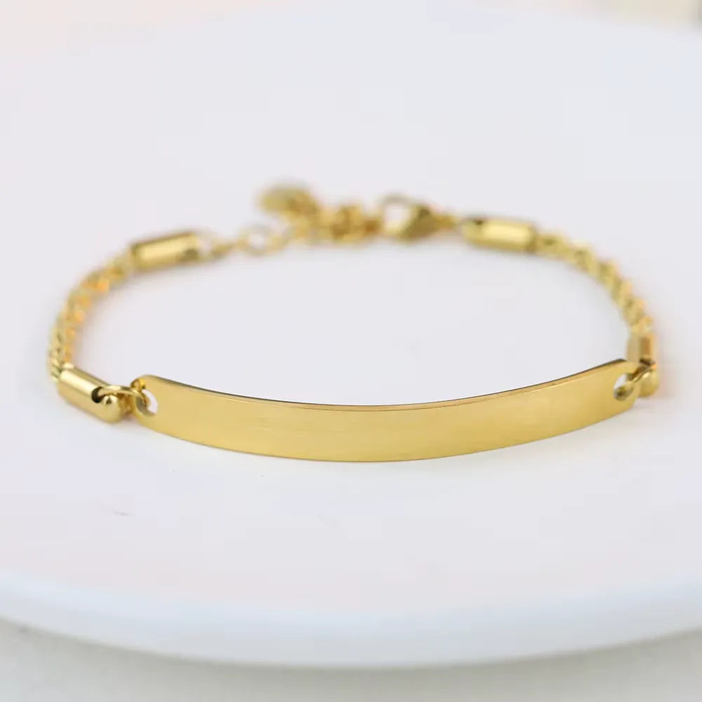 Gourmette maille torsadée en acier inoxydable plaqué or jaune vue de face.