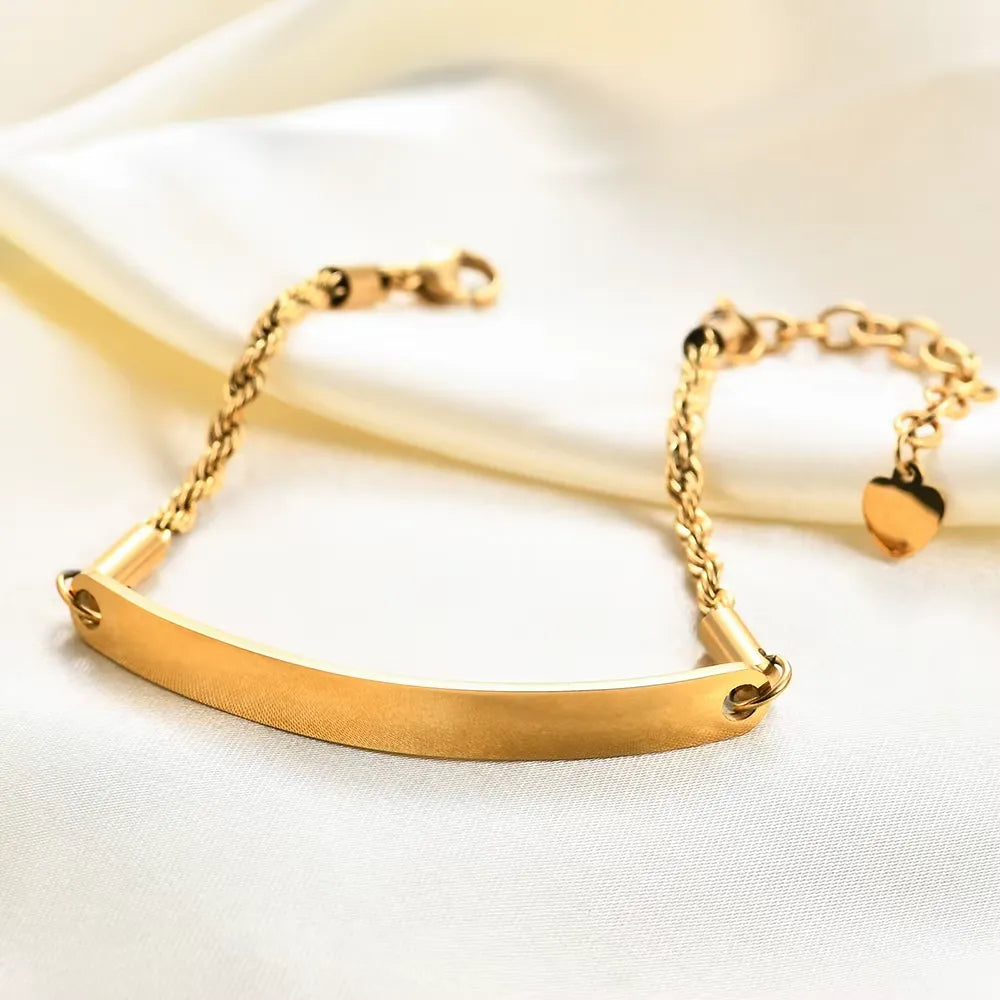 Gourmette maille torsadée en acier inoxydable plaqué or jaune ouvert.