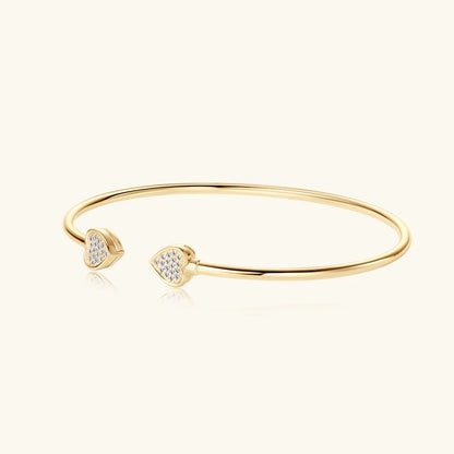 Jonc duo cœur doré en argent 925 plaqué or jaune et diamants en moissanite scintillants vue de côté.
