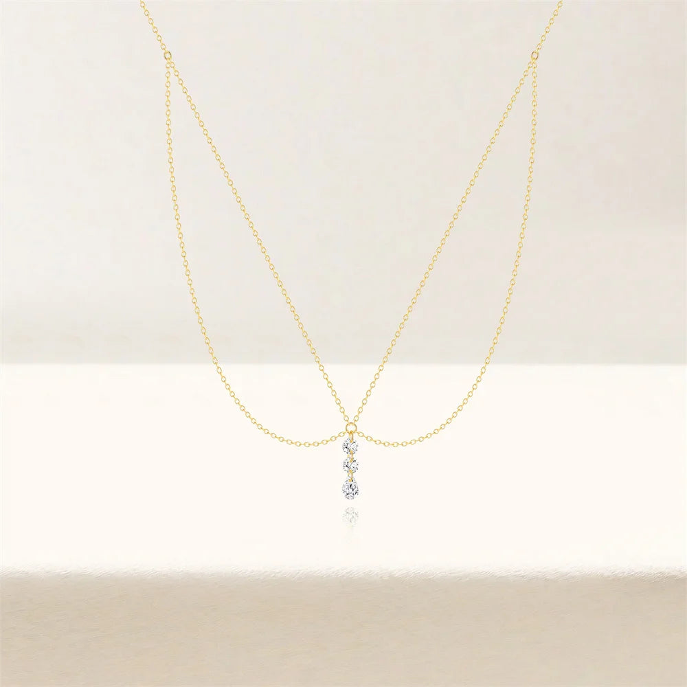 Multi-chaînes en argent 925 plaqué or jaune et pendentif d'oxydes de zirconium vue de face.