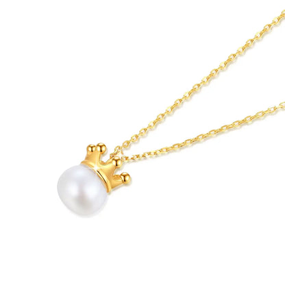 Pendentif couronne du roi Louis en or jaune 18K raffiné et perle naturelle à plat.