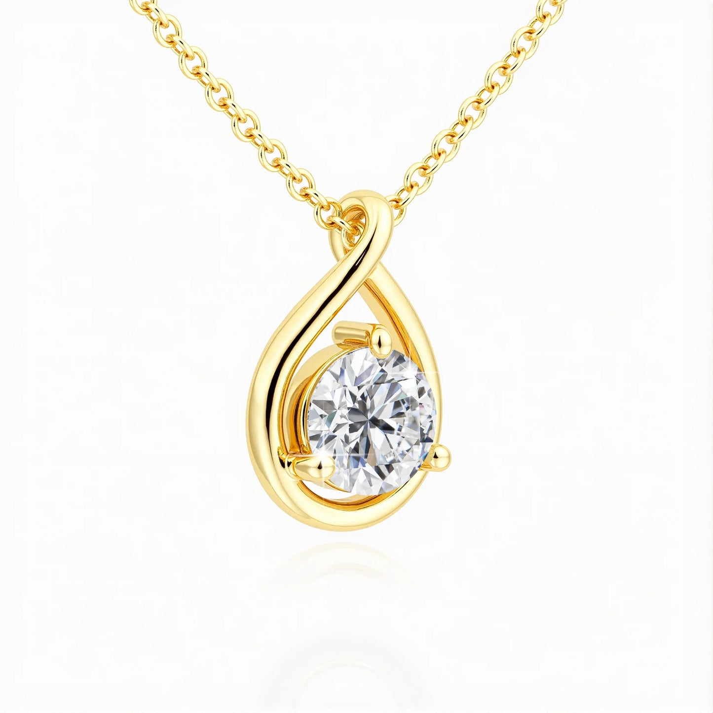 Pendentif goutte solitaire Océane en or jaune 14K raffiné et diamant rond serti trois griffes vue de côté.