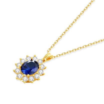 Pendentif halo saphir ovale en or jaune 18K et diamants ronds scintillants à plat.