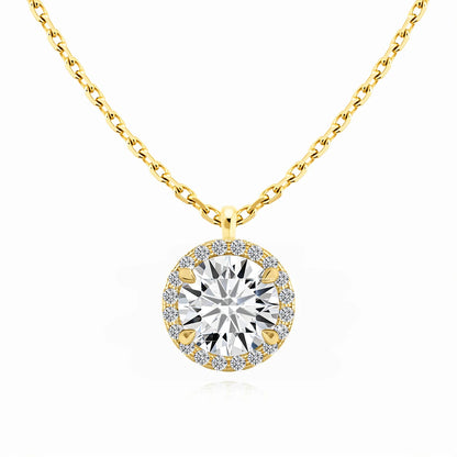 Pendentif médaillon rond Volter en or jaune 14K orné de diamants sertis quatre griffes sur fond blanc.